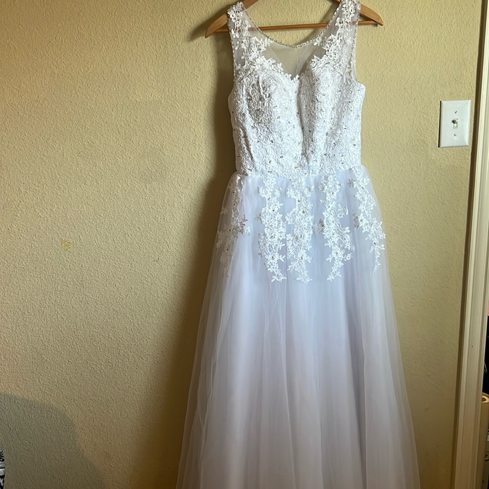 Floral embroidered white bridal gown, debutante